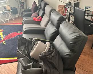 Man cave with chairs and television