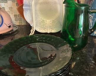Green plates and pitcher