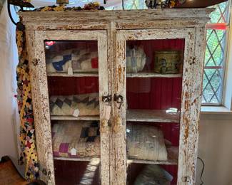 Chippy White Glass Front Cabinet, Quilts