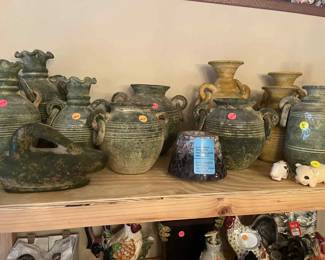 Pottery. Chicken and pig decor items.