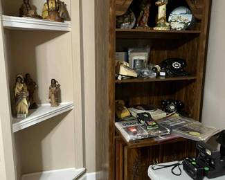 Indian decor, Pine book case with light, rotary and push button phones, vintage news papers, race car phone, cameras