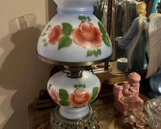 Sears pair of 1976 blue milk glass hurricaine lamp with hand painted roses. Both top and bottom light up.