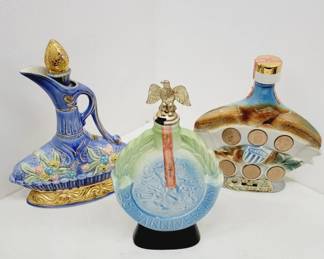 	Lot Of Three Ceramic Liquor Decanters