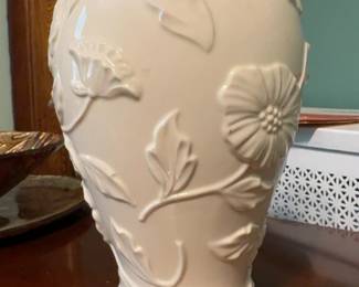 $12.50 This gently used 10inch floral embossed vase offers a touch of elegance to any space. The detailed floral design adds a classic charm, making it a beautiful decorative piece