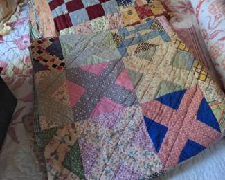 Various hand stitched and needlepoint quilts
