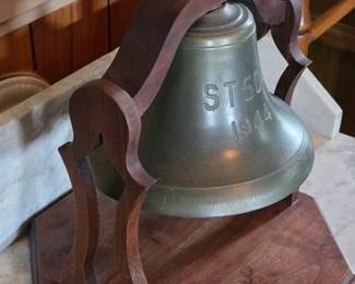 Ship's bell in display stand