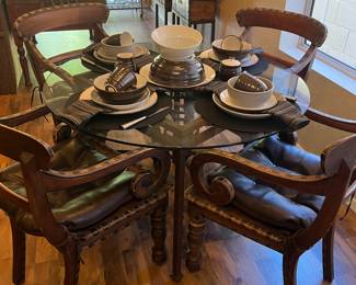Several different styles of dinnerware, table linens, flatware and glassware