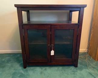TV stand opens for storage