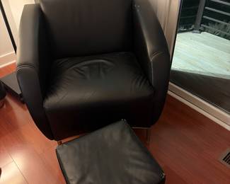 Black leather chair with ottoman 