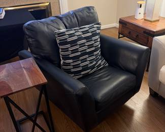 Two navy blue swivel leather chairs 2years old 