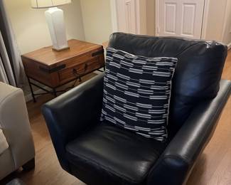 Navy blue leather swivel chair 2years old great look 