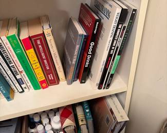 Assorted books and art supplies 