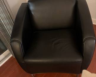 Black leather chair we have two of these 