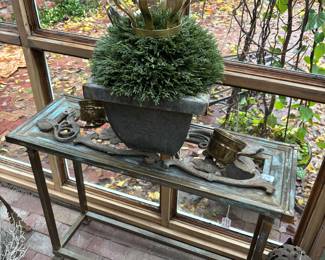 The brass with fabulous patina console table is amazing. It just needs a glass top or you can always wing it like we did with iron work!