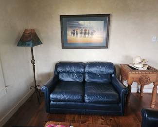 leather love seat, western lamp, display western table