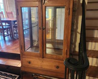 Display cabinet on iron legs