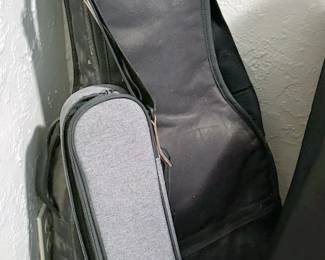 Yamaha guitar with case
Ranch UK23 ukulele with case 
