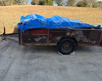 Utility trailer with brand new tires it will be empty on day of sale