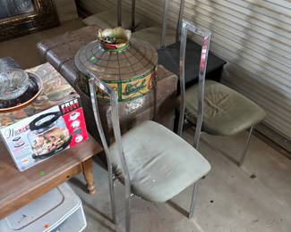 Old antique chest old Coca-Cola light and some table chairs