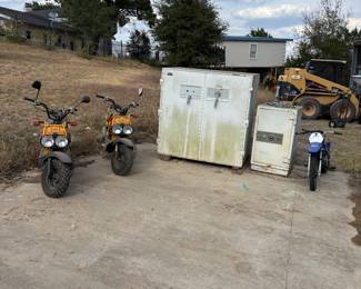 2 Data safes one is about foot tall and 5 foot wide and the other is about 3 1/2 foot tall and 2 foot wide and Yamaha YZ 90 dirt bike and two Honda ruckus