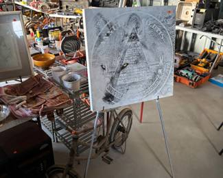 Antique Schwinn bike and a wolf collage picture with a canvas stand a few household goods