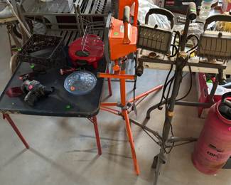 Work lights, Nikon camera candy jar, antique kids table pump sprayer a few other household good little shelving racks