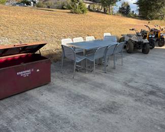 Two full sets of chairs, two tables 4 wheeler and two Honda ruckus is with a job site security box