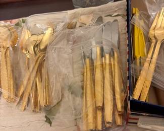 A set of gold cutlery