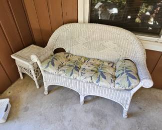 Wicker loveseat and side table