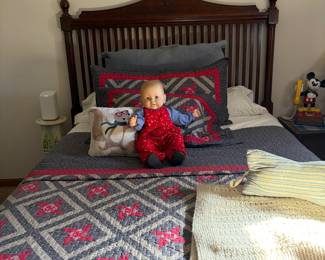 Quilts and a very cute baby doll!