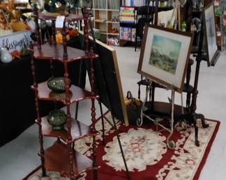 What-not shelves, local art work, Asian carpet