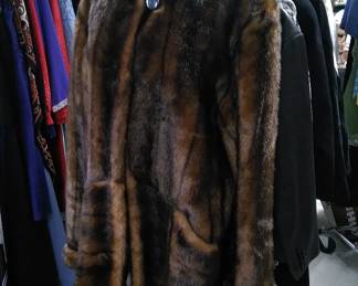 One of the winter coats and some of the faux fur hats