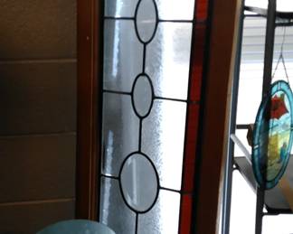 Antique leaded glass window. blue table lamp