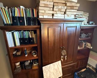 Lots of collectors plates in those boxes uptop