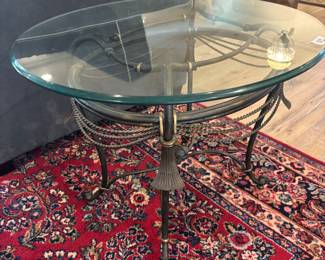 Oval Glass Top end tables w metal base
(2) $100.00 each 29”w 23.5”d 21” t