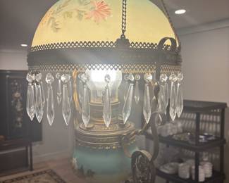 Antique hanging oil lamp $500.00
16”w 14” globe 40” ceiling to bottom