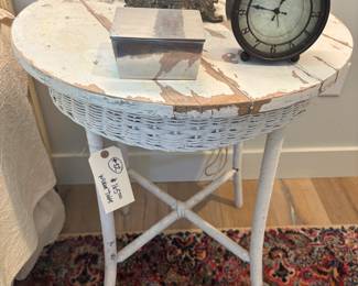 White wicker distressed Table $165.00
24” diameter 30” t