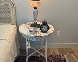 Antique Globe lamp $325.00
7.5” base 29” t
White wicker distressed Table $165.00
24” diameter 30” t
