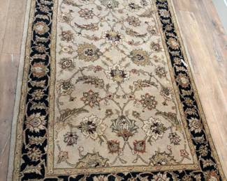 Beige & Black area rug 5’x 7’9” $350.00