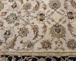 Beige & Black area rug 5’x 7’9” $350.00