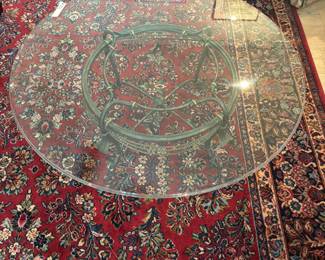 Round Glass Top coffee table on metal base $150.00. 39”dia. 15.5”t