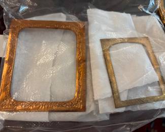 collection of antique daguerreotype and ambrotype cases, along with some of the images they would contain. $150.00 lot