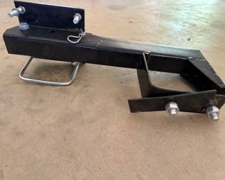 Spare tire holder for an RV