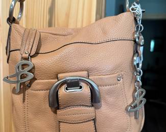 This is a B. Makowsky Westbourne tan pebbled leather crossbody shoulder handbag. 
