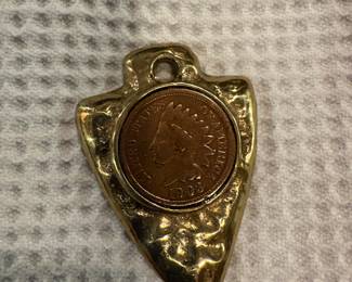 1903 Indian Head penny set in brass arrowhead pendant