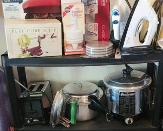 Georgetown Forman Grills, apple peeler, chopper, irons, pressure cookers, electric fry pan, roating pan nib...shelving.