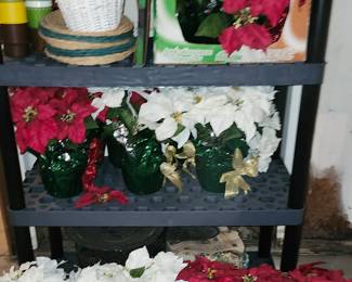 Many Faux Poinsettias.