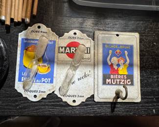Vintage French Advertising Plaques with Egg Timers and One With Hook.