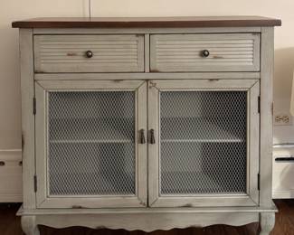 Wire Front Slim Profile Cabinet. Measures 40" W x 11" D x 36.5" H.