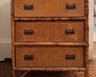 Three-Drawer Burnt Bamboo & Rattan Chest of Drawers. Measures 30" W x 18" D x 37" H. Photo 1 of 6.